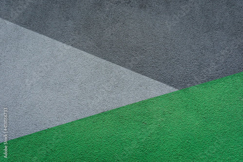 white, grey and green painted wall, background with space for text as a template