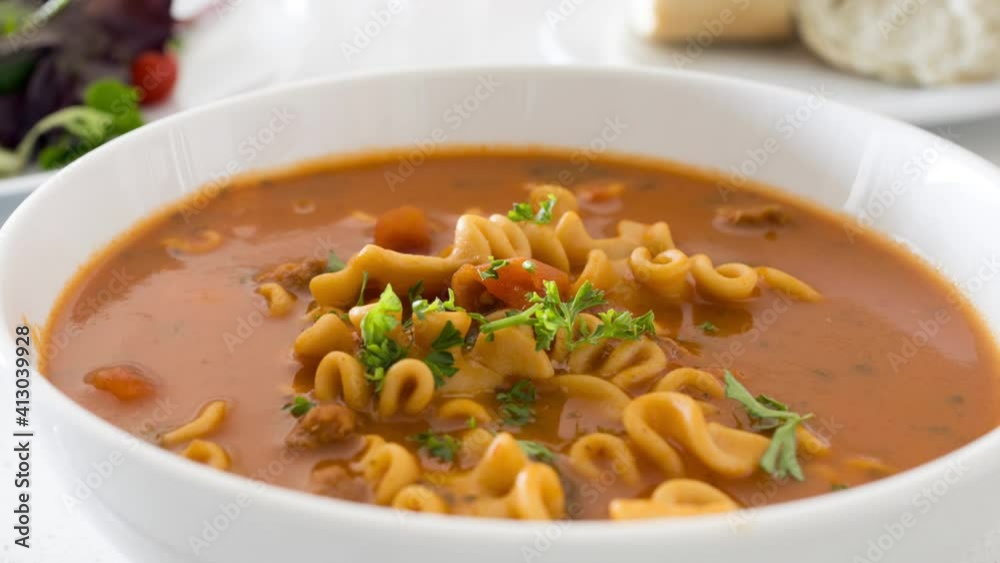 Zooming out of a Bowl of Tomato Vegetable Soup Zooming out of a Bowl of Tomato Vegetable Soup