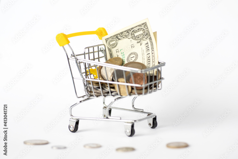 metal supermarket trolley full of money
