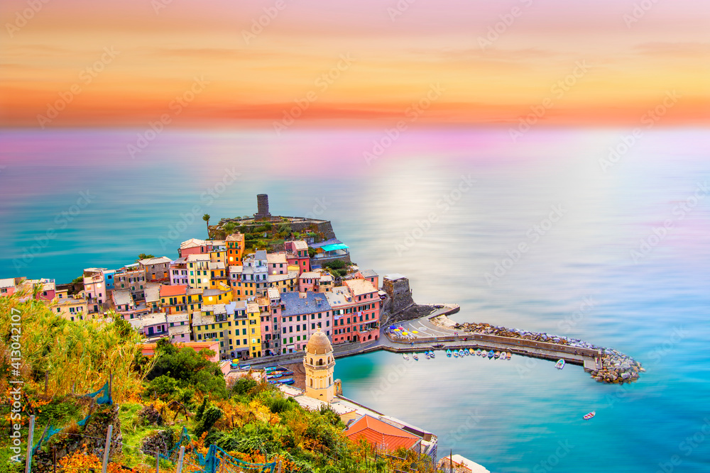 Colorful sunset on Vernazza in cinque terre on the mountain near mediterranean sea in liguria - Italy