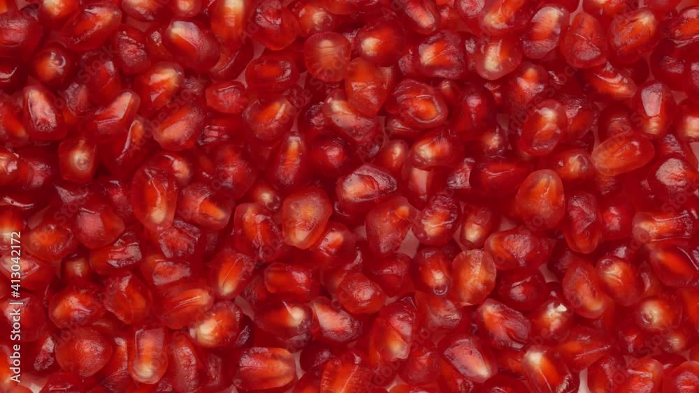 Pomegranate seeds - background. Pomegranate peeled, top view. Pomegranate seeds - background. Pomegranate peeled, top view.