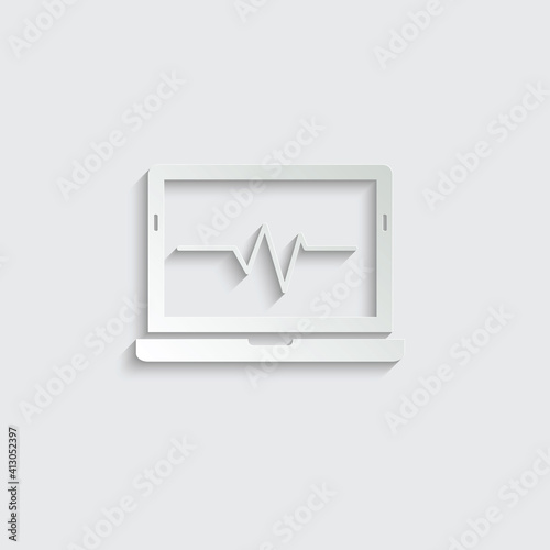 Paper laptope  with heartbeat. stethoscope icon heart beat photo