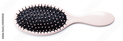 hairbrush isolated on white background. pink hair brush cut out. design element. personal grooming accessory