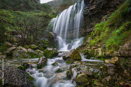 Beautiful waterfall in the mountains of Serra de Aire  Portugal. Long exposure of the waterfall of Fornea in Porto de Mos  Portugal. 
