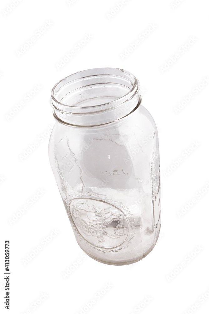 Closed empty glass jar with metal lid isolated on white Closed empty glass jar with metal lid isolated on white