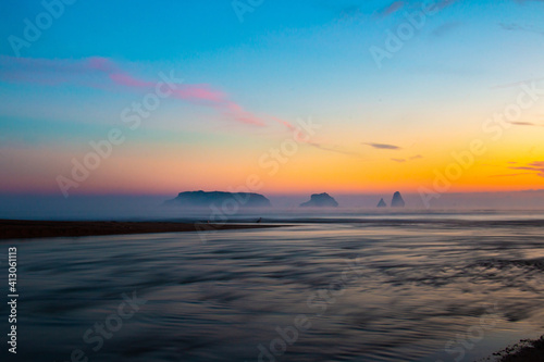 Fototapeta Naklejka Na Ścianę i Meble -  Sea landscape. Morning lights with a calm atmosphere with mist and a bird. Mouth of river Ter in Mediterranean Sea with the Medes Islands. Tourism in Torroella de Montgri, Ampurdán, Catalonia, Spain.