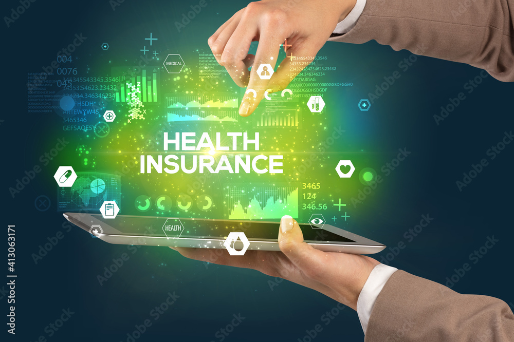 Close-up of a touchscreen with HEALTH INSURANCE inscription, medical concept Close-up of a touchscreen with HEALTH INSURANCE inscription, medical concept