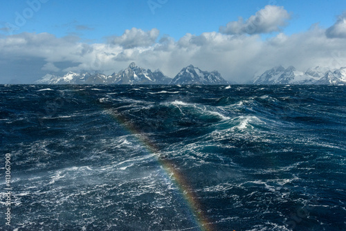 South Georgia Island. Rainbow over the ocean off of Drygalski Fjord.