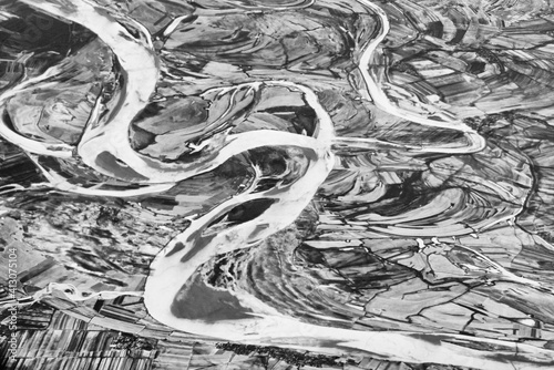 Aerial view of land and Songhua River covered by ice, northeast China photo