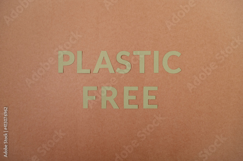Plastic Free cardboard letters on a craft paper