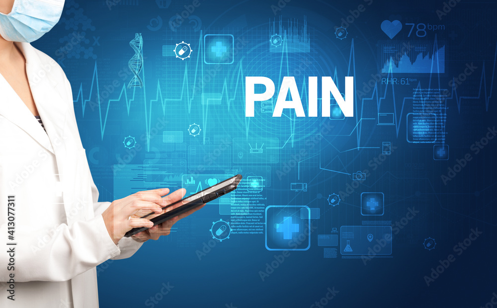young doctor writing down notes with PAIN inscription, healthcare concept young doctor writing down notes with PAIN inscription, healthcare concept