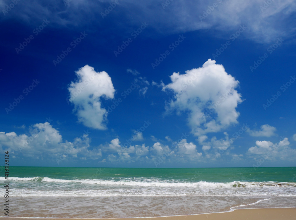 Beautiful tropical sea and sand beach with blue sky in sunny day