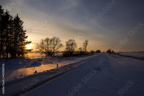 Winter landscape at sunset time. © Angelika