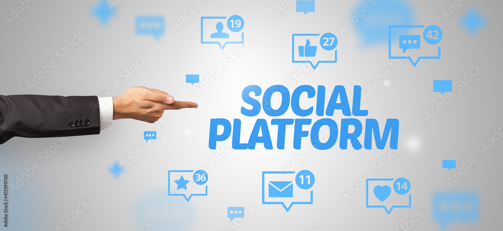 Close-Up of cropped hand pointing at SOCIAL PLATFORM inscription, social networking concept Close-Up of cropped hand pointing at SOCIAL PLATFORM inscription, social networking concept