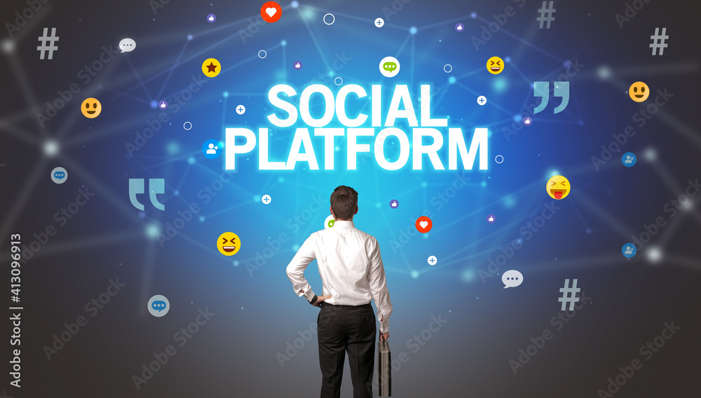 Rear view of a businessman with SOCIAL PLATFORM inscription, social networking concept Rear view of a businessman with SOCIAL PLATFORM inscription, social networking concept