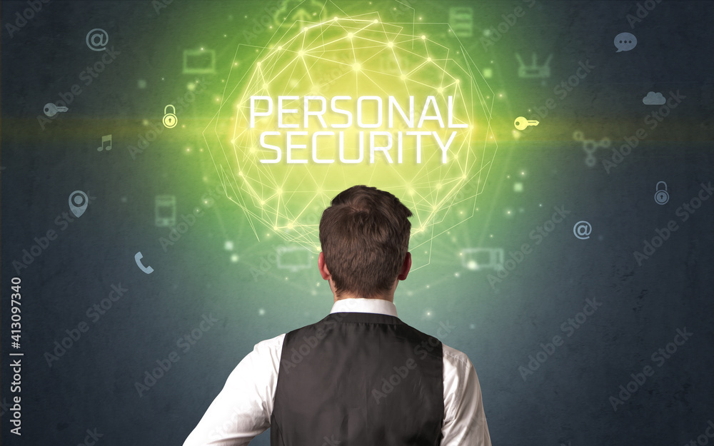 Rear view of a businessman with PERSONAL SECURITY inscription, online security concept Rear view of a businessman with PERSONAL SECURITY inscription, online security concept