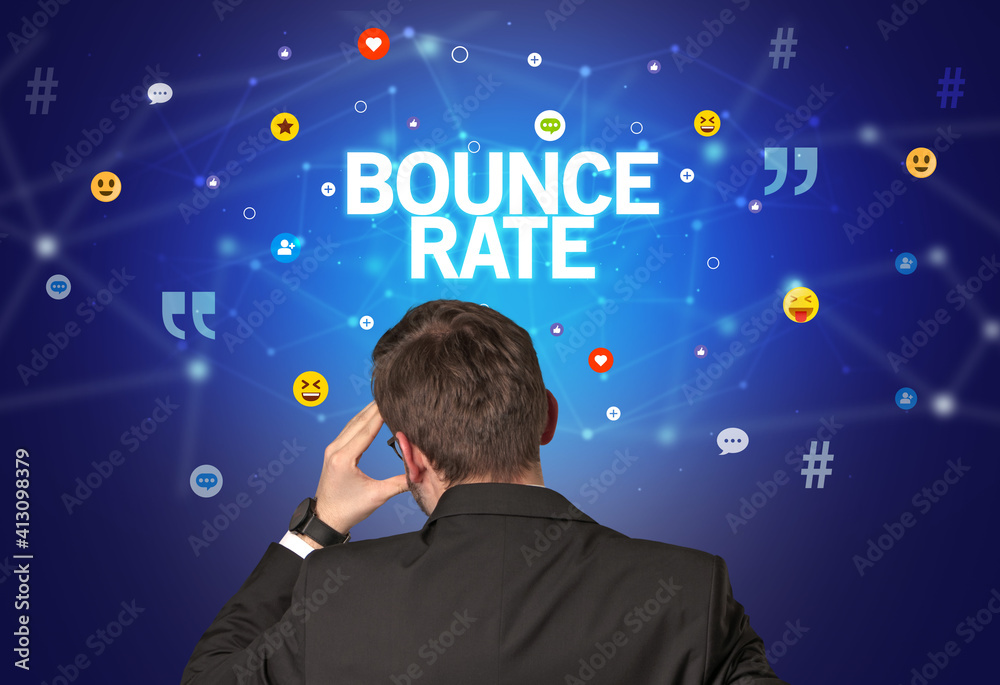 Rear view of a businessman with BOUNCE RATE inscription, social networking concept Rear view of a businessman with BOUNCE RATE inscription, social networking concept