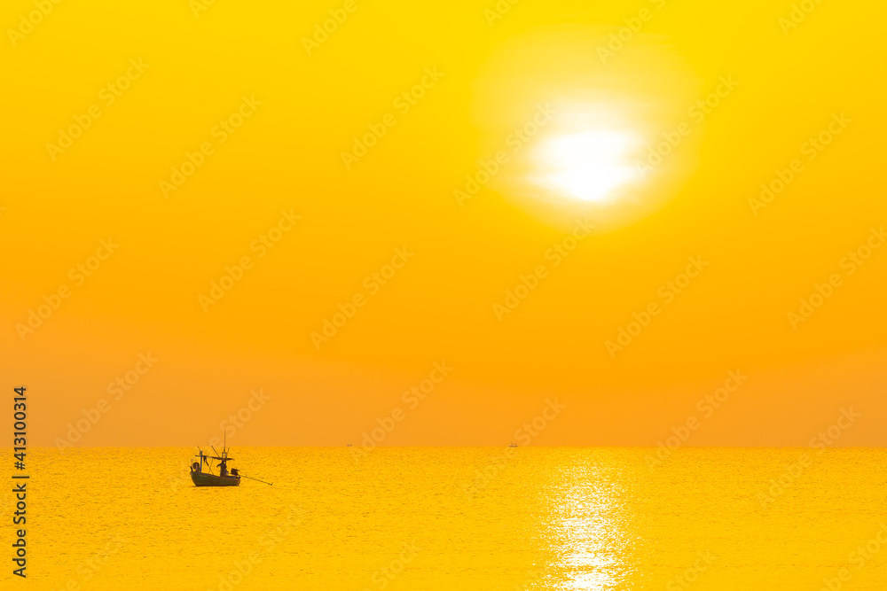 Beautiful tropical beach sea ocean at sunset or sunrise