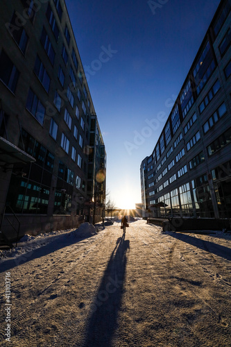 Photography Stockholm, Sweden  Pedestrians in the Marievik neghborhood in the early morning winter sun