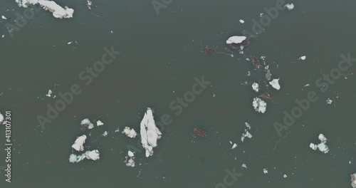 Ice drift on of the river in early spring of ice float down the stream