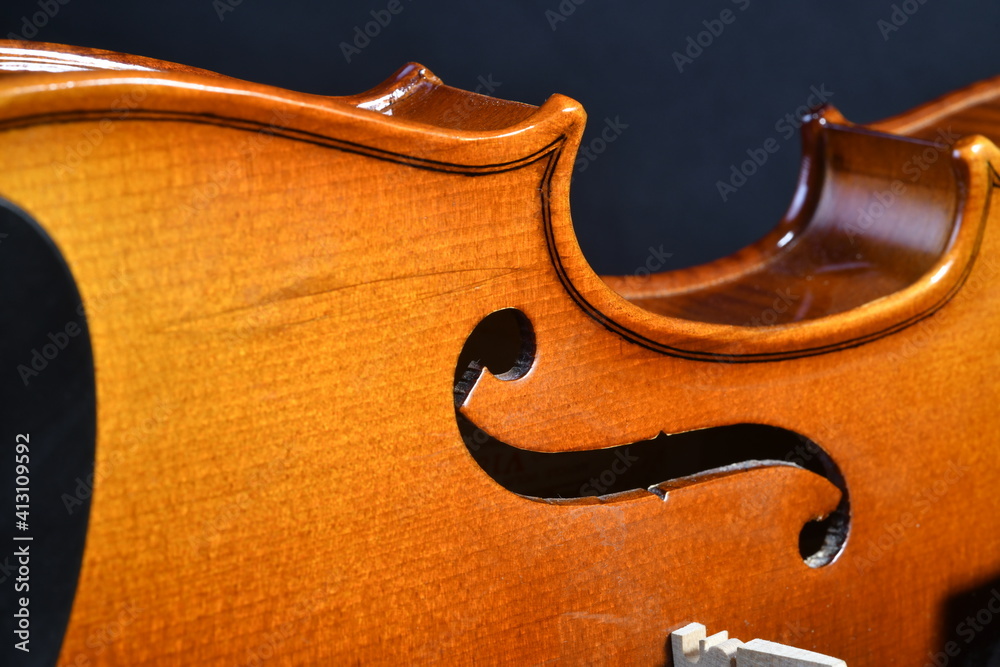 close up of violin scroll, musical instrument close up of violin scroll, musical instrument