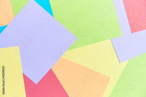 Colorful background: square sheets of paper of different colors