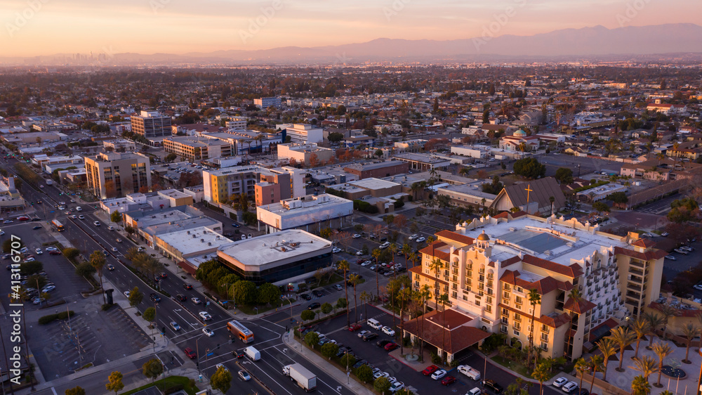 Sunset aerial view of downtown Downey, California, USA.