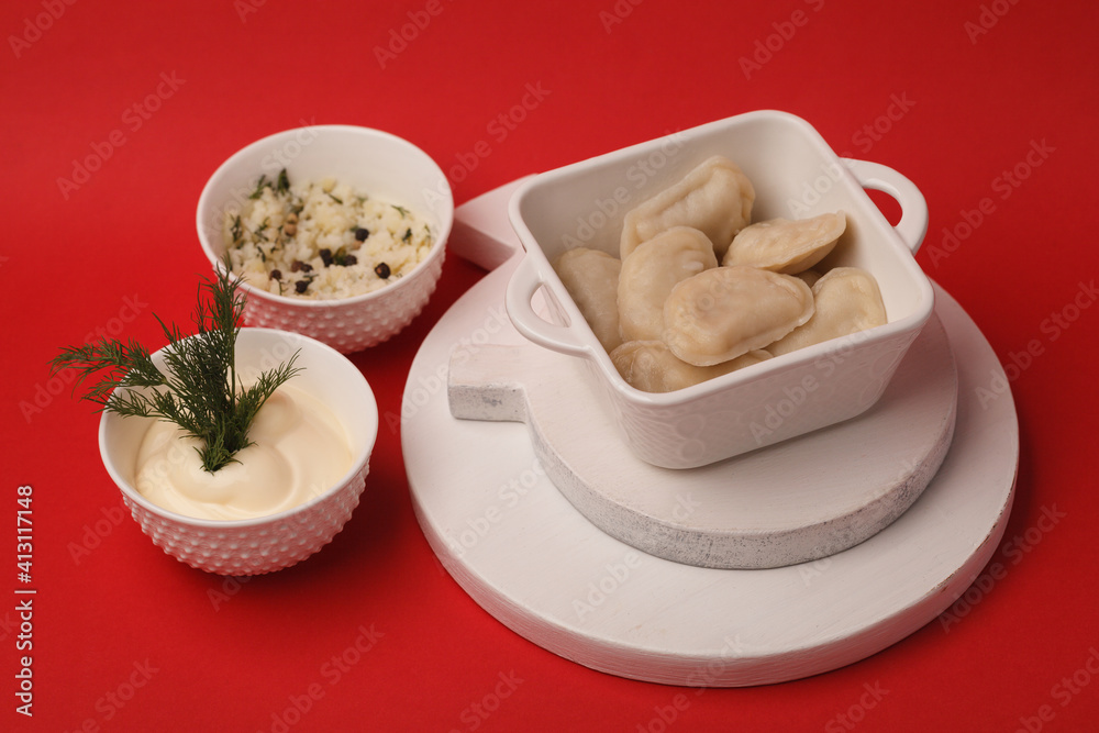 Hand-made dumplings. Cooking dumplings. Cooked dumplings with herbs and vegetables