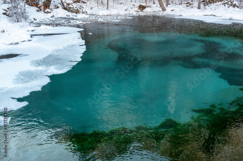 Geyser Lake (also Blue Lake) in winter. Altai Republic, Russia.