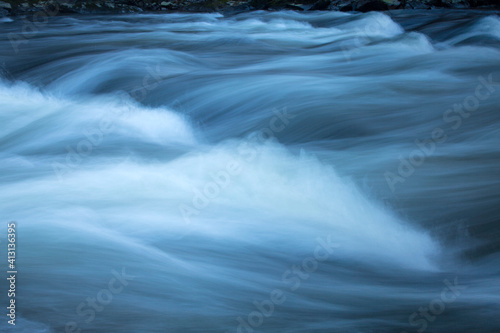 Closeup of whitewater rapids in the Farmington River, Simsbury, Connecticut. photo