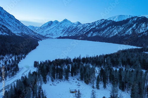 Winter look of Lower Multa lake (Nizhnee Multinskoye) in the night. Altai Republic, Siberia, Russia.