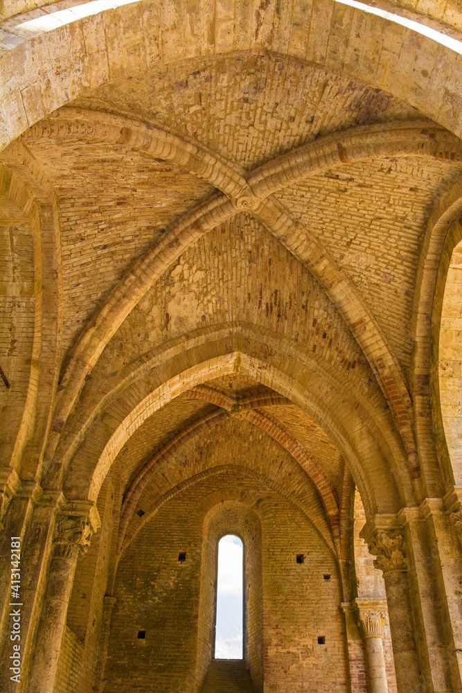 A rib vault in the remains of the roofless San Galgano Abbey in Siena Province, Tuscany. The Gothic 13th-century Abbey was founded as a Cistercian Monastery A rib vault in the remains of the roofless San Galgano Abbey in Siena Province, Tuscany. The Gothic 13th-century Abbey was founded as a Cistercian Monastery