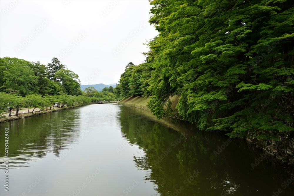 Moat, broad ditch at Hikone castle in Shiga Prefecture, Japan - 彦根城 お堀 城壁 日本 滋賀