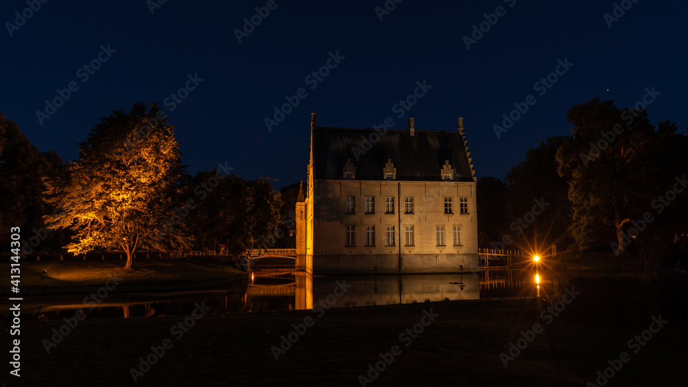 Cortewalle Castle, in Beveren, Belgium, at night