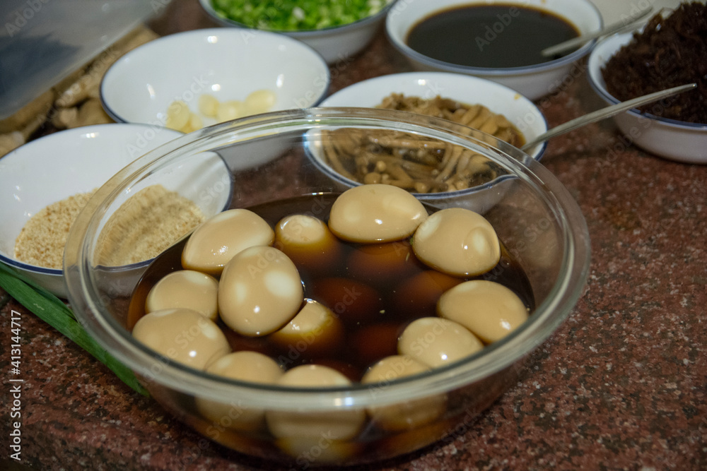 Bowl of Medium-Boiled Eggs, marinated in a Japanese sauce containing Soy and Mirin Bowl of Medium-Boiled Eggs, marinated in a Japanese sauce containing Soy and Mirin