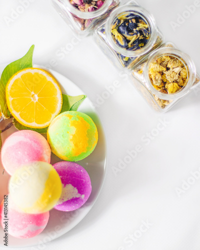 multicolored bath bombs on a light background