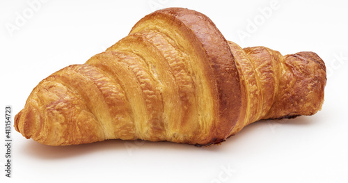 Crispy fresh butter croissant. Isolated on white background.