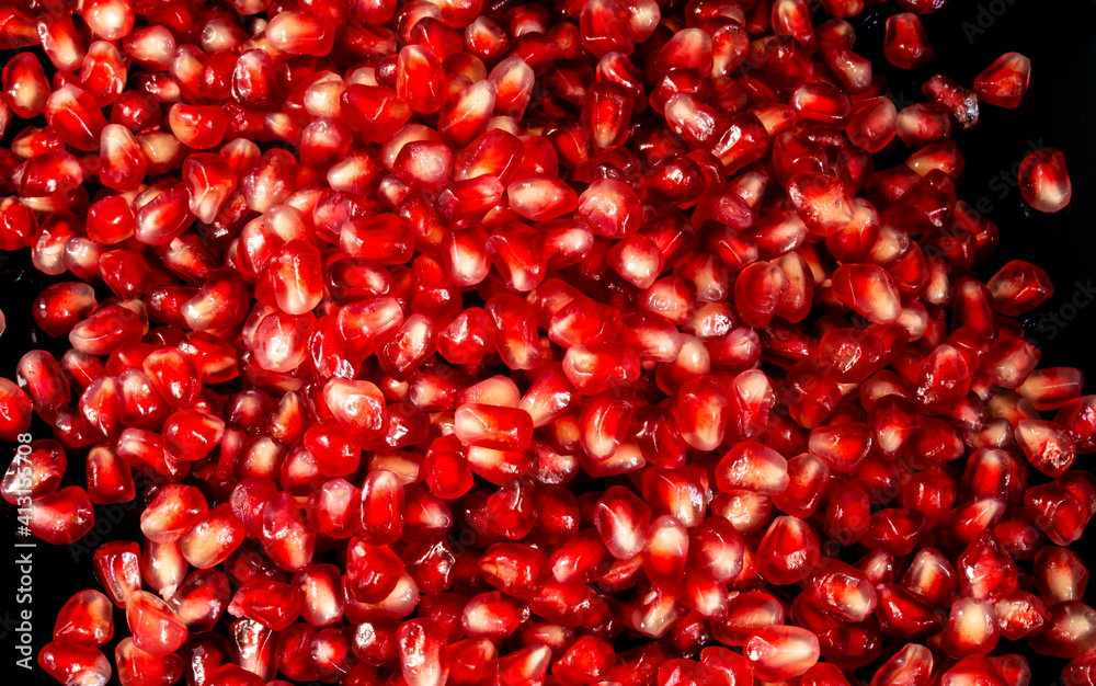 juicy red pomegranate seeds close up juicy red pomegranate seeds close up
