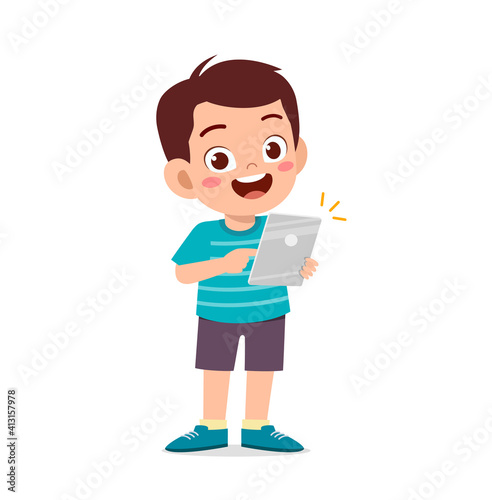 cute little boy using smartphone and internet