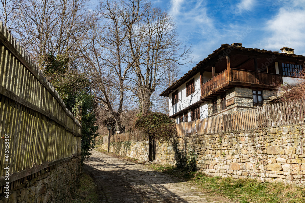 Photo of old street and house representing the bulgarian traditional architecture. Photo of old street and house representing the bulgarian traditional architecture.