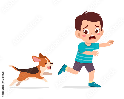 cute little boy scared because chased by bad dog