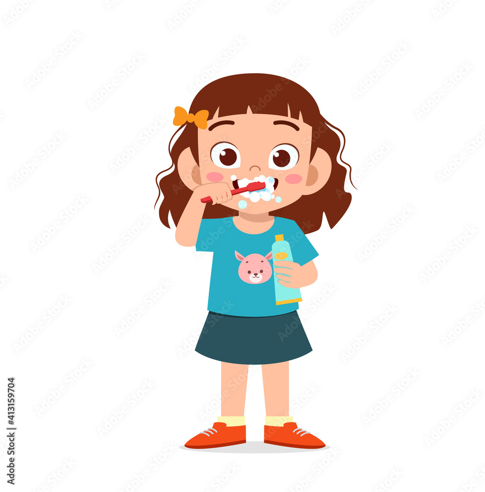 cute little girl brushing teeth and holding toothpaste