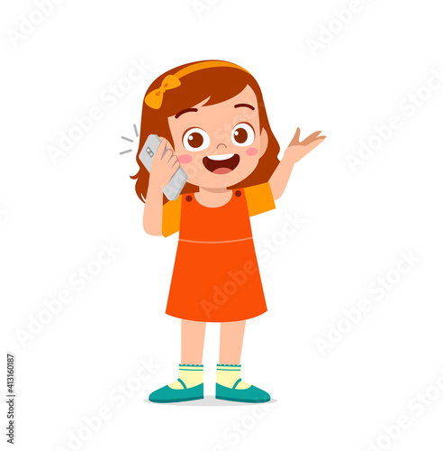 cute little girl talk using mobile phone