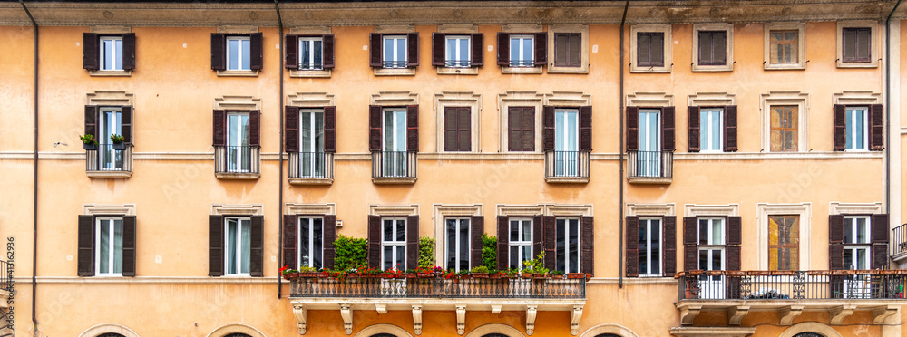Windows of residential house in Rome