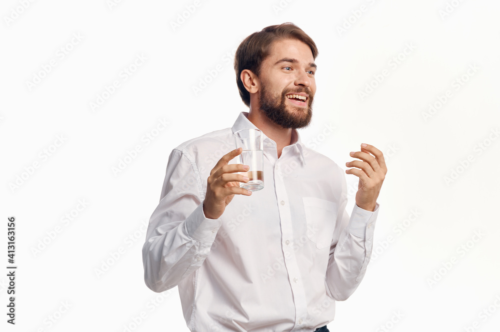 man with glass of water white shirt lifestyle drink light background man with glass of water white shirt lifestyle drink light background