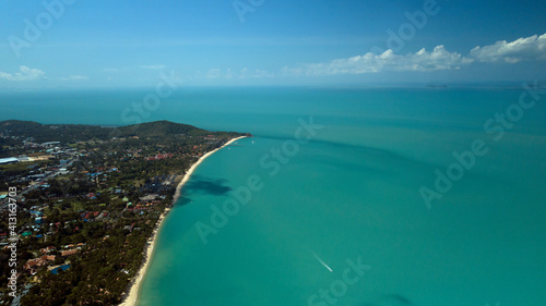 Aerial image of pristine tropical beach - high altitude - Mae Nam Beach - Koh Samui island in Thailand