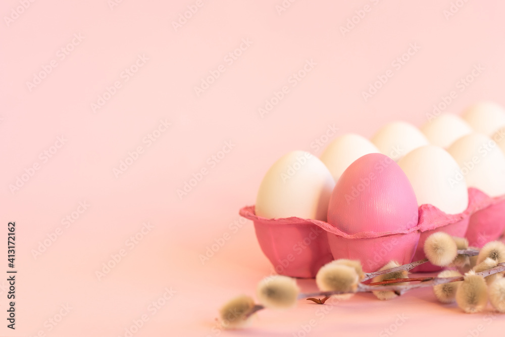 Holy Easter. Pink and white eggs on a pink background.