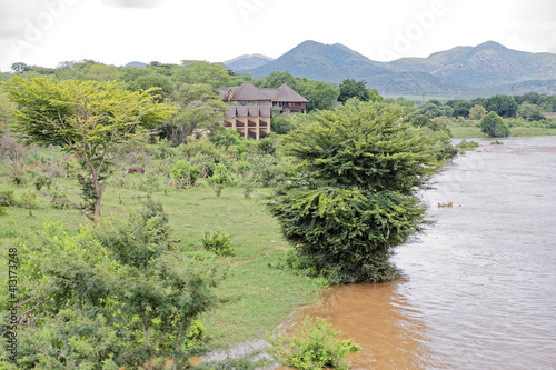 Crocodile river heavy flow possibly leaving animals stranded on the wrong side of riverbank. As seen from Malelane bridge Kruger National park