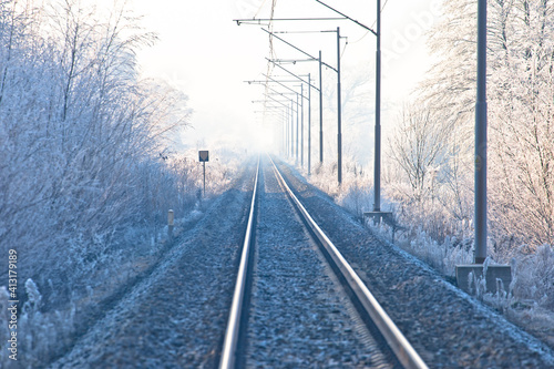 Railroad track in frost landscape view