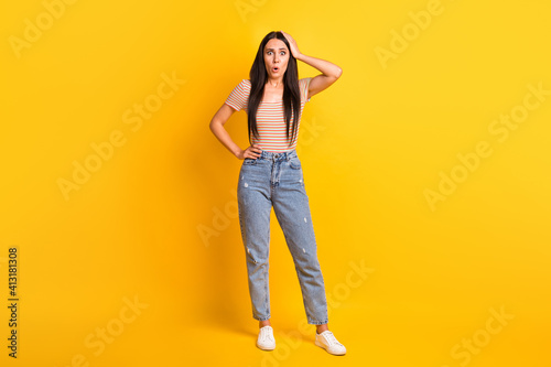Full length body size photo of female student stressed depressed forgot lost opened mouth isolated on bright yellow color background